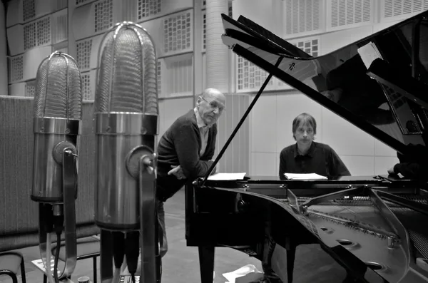 Gert Palmcrantz leaning on the piano with Jan Lundgren, Didrik de Geer microphones in the foreground, Studio 3, Sveriges Radio, May 2012.