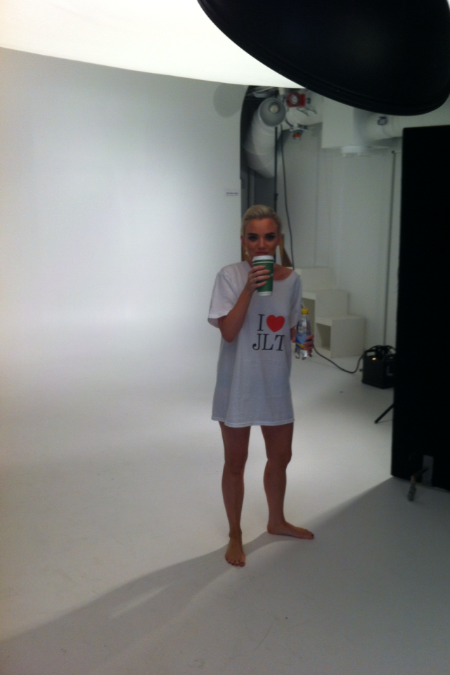 Model in an I love JLT t-shirt on the studio set during the promotional shoot.
