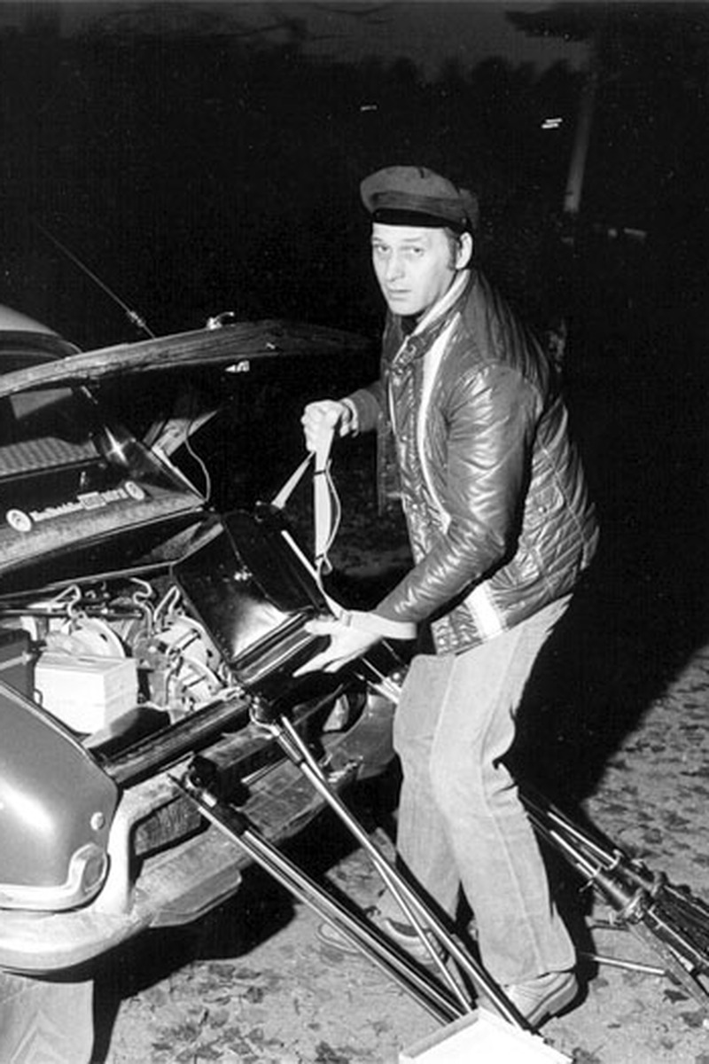 Gert Palmcrantz loading a Nagra recorder and microphones from the trunk of a vintage car